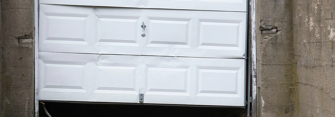Garage Door Got Hit By A Car Dent Removal in Regent Park, SK