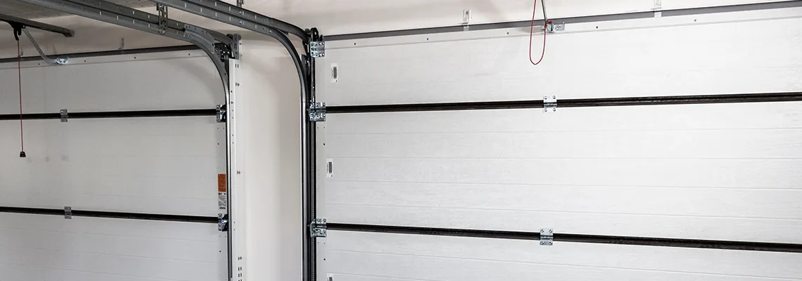 Fix Folding Garage Door Jerking in Regent Park, SK