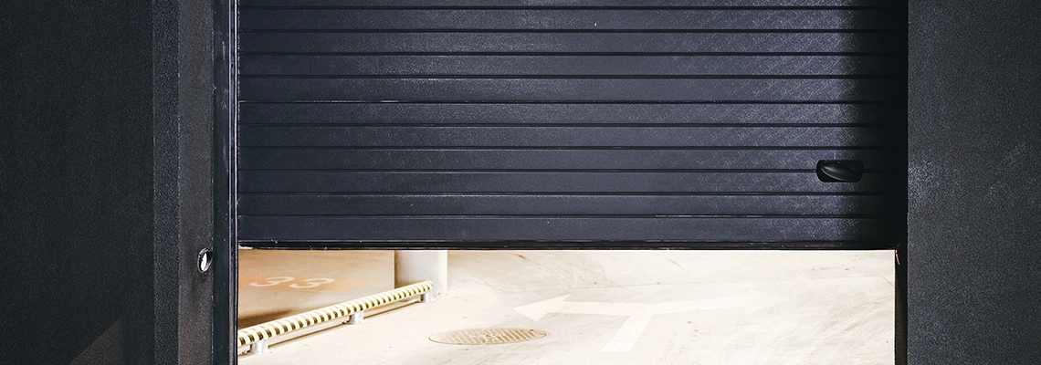 Residential Black Garage Door Installation in Regent Park, SK