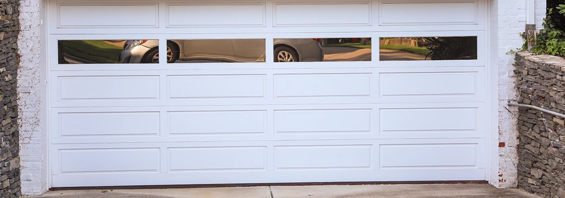 Wood Garage Door Bang Sound Repair in Saskatchewan