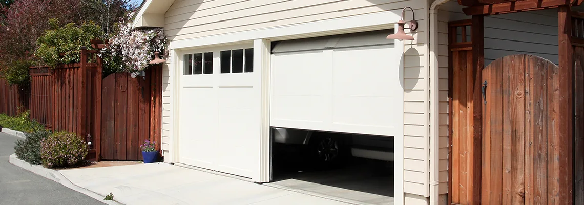 Fix Metal Garage Door Jerking in Regent Park, SK