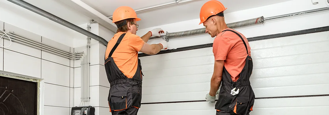 Car Drove Into Sliding Garage Door Replacement in Regent Park