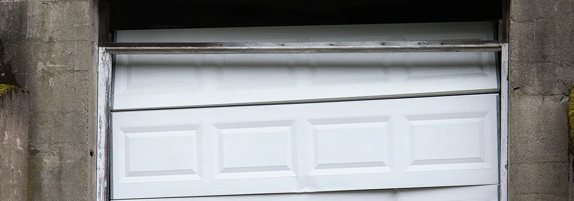 Fallen Commercial Garage Door Repair in Regent Park, SK